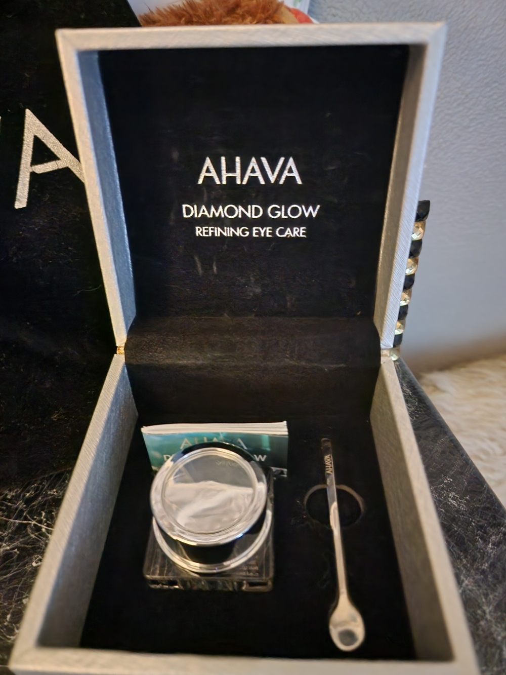 AHAVA Diamond Glow Eye Care Cream White & Silver Textured Box